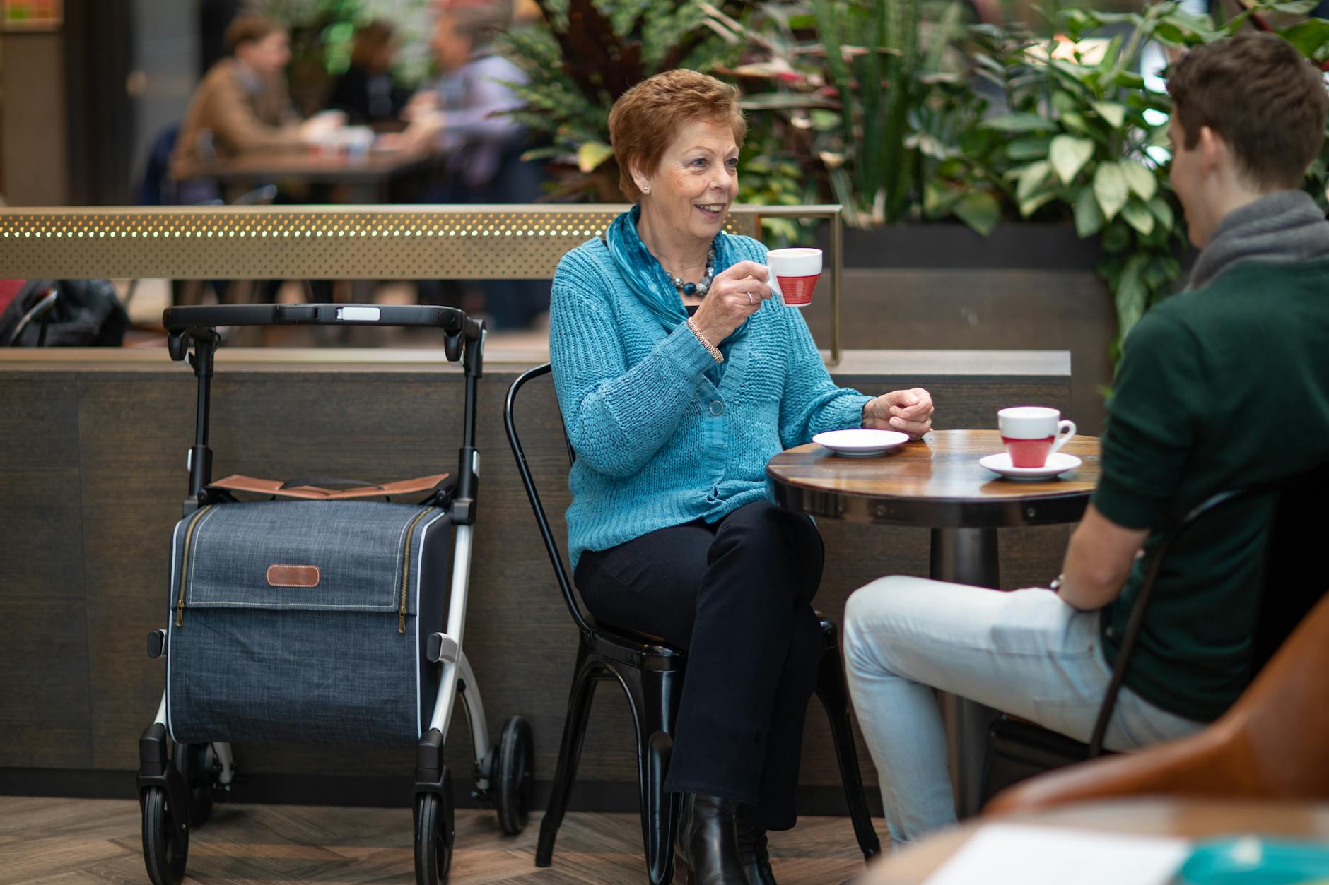woman sitting drinking tea